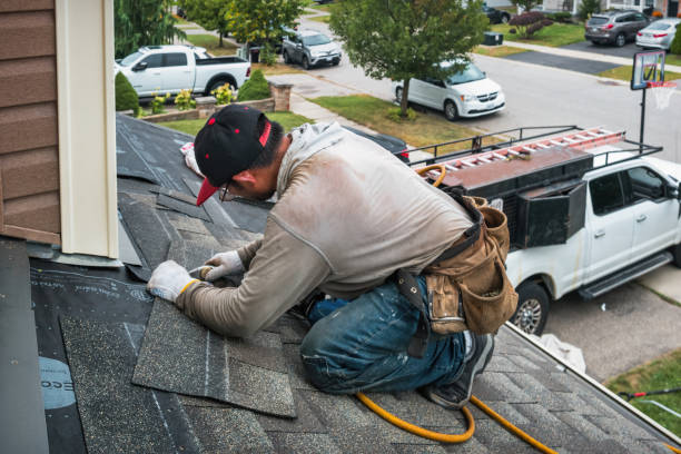 Professional Flat Roof Repair technician working in Grassflat, PA